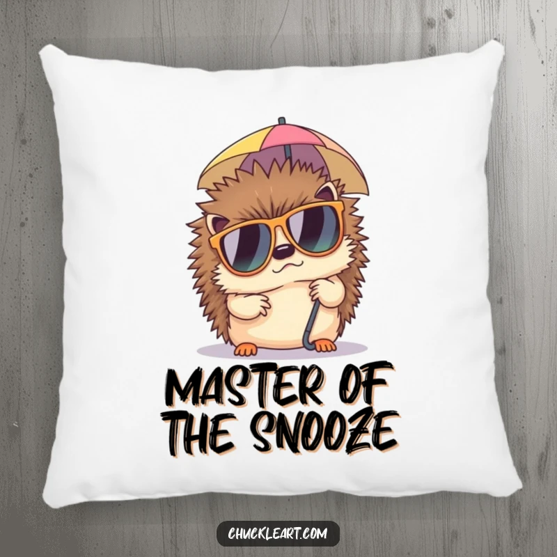 Funny pillow with a grumpy hedgehog wearing sunglasses, trying to nap under a tiny umbrella, adding humorous comfort to any room.
