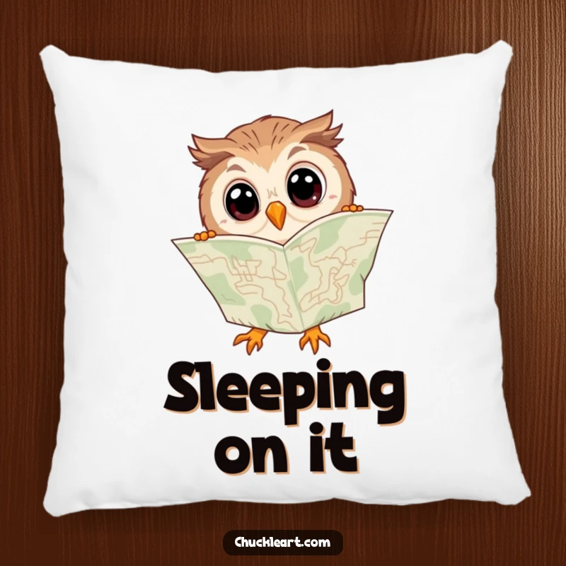 Funny pillow design of a clumsy owl, wide-eyed, trying to read a map upside down with hilarious bewilderment.