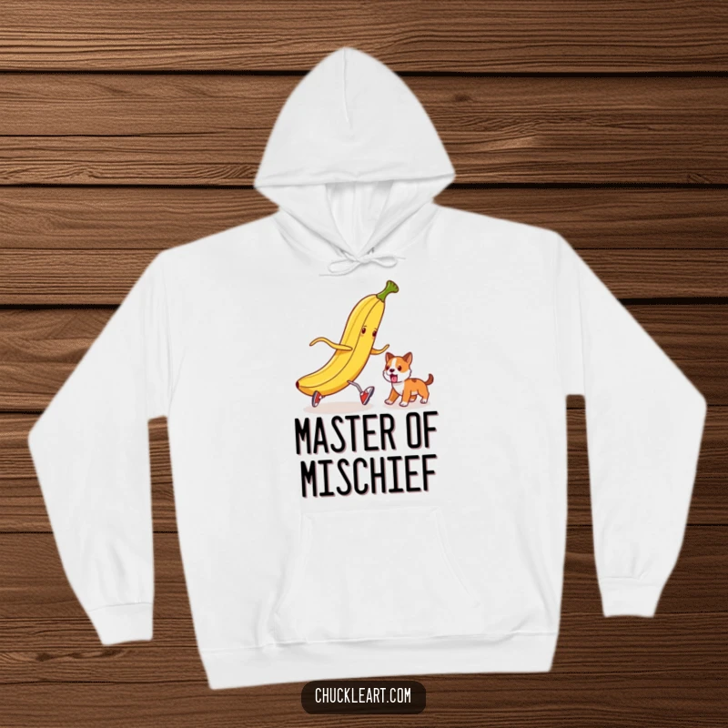 Funny banana peel in tiny shoes attempting to trip a dog, depicted on a cozy hoodie.