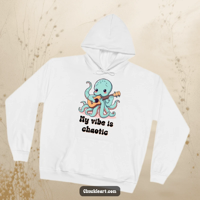 Comfortable hoodie showcasing a funny, multi-tentacled octopus hilariously attempting to play a ukulele, perfect for music lovers.