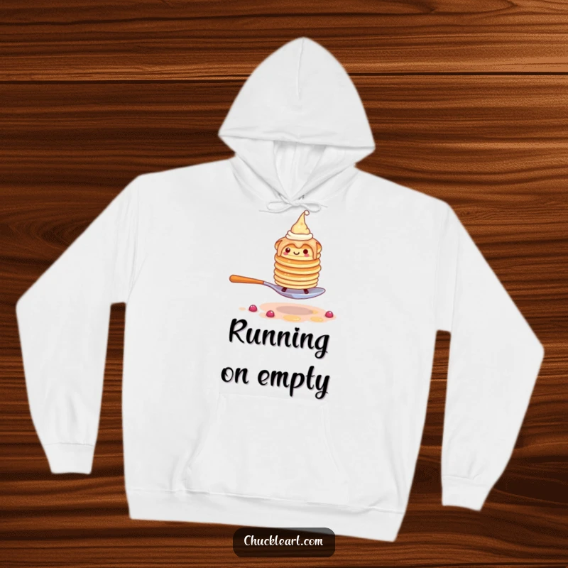 Funny hoodie featuring a wobbly pancake stack in hats, comically attempting to flee from an enormous fork.