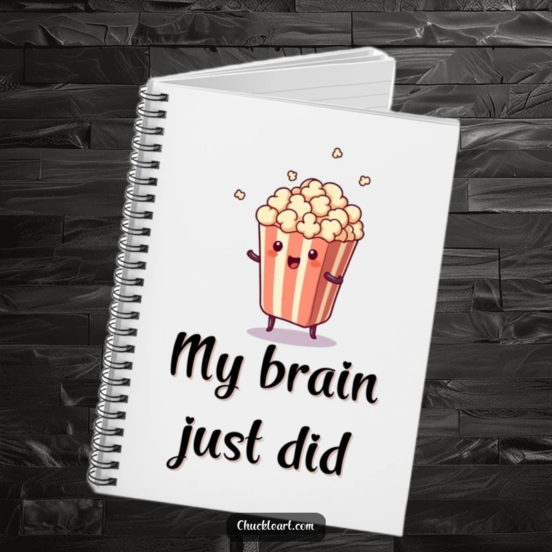 Funny notebook cover with a piece of popcorn comically jumping out of its bag, designed to inspire creativity.