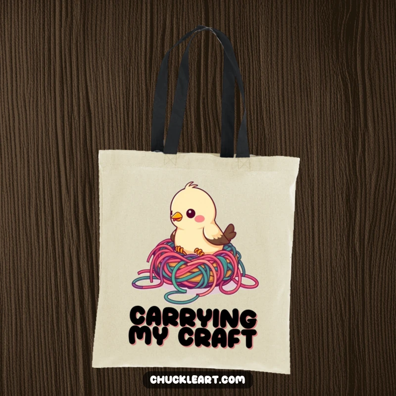 Funny bird tote bag showing a bird building a nest with colorful, tangled yarn, excellent for carrying supplies with crafty humor.