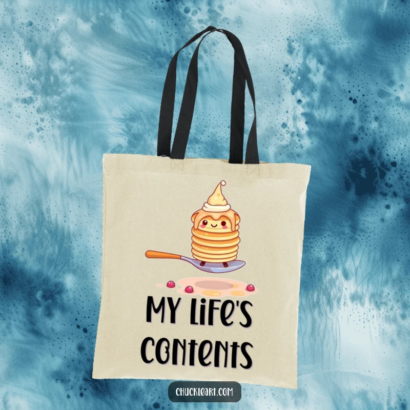 Funny tote bag showcasing a wobbly pancake stack with hats, comically evading a giant fork, perfect for everyday use.