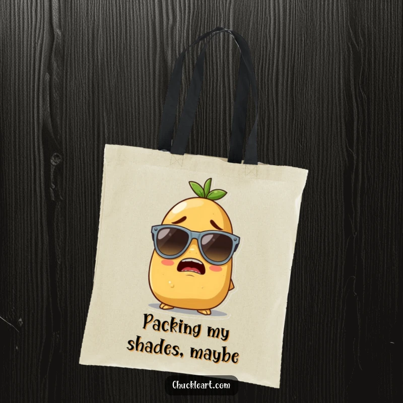 Funny tote bag showing a determined potato character hilariously trying to wear sunglasses that are much too large for its head.